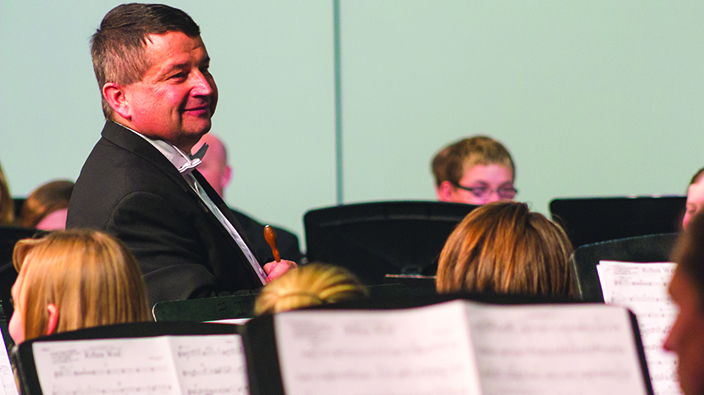 Calvin Hofer directs the CMU Wind Symphony during the Best of the West music festival