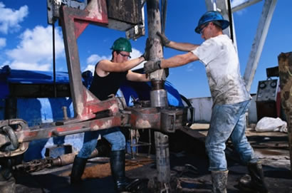 Oil workers on rig