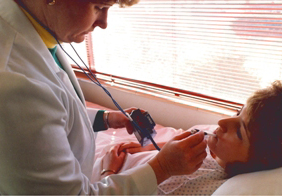 Nurse Aide taking temperature