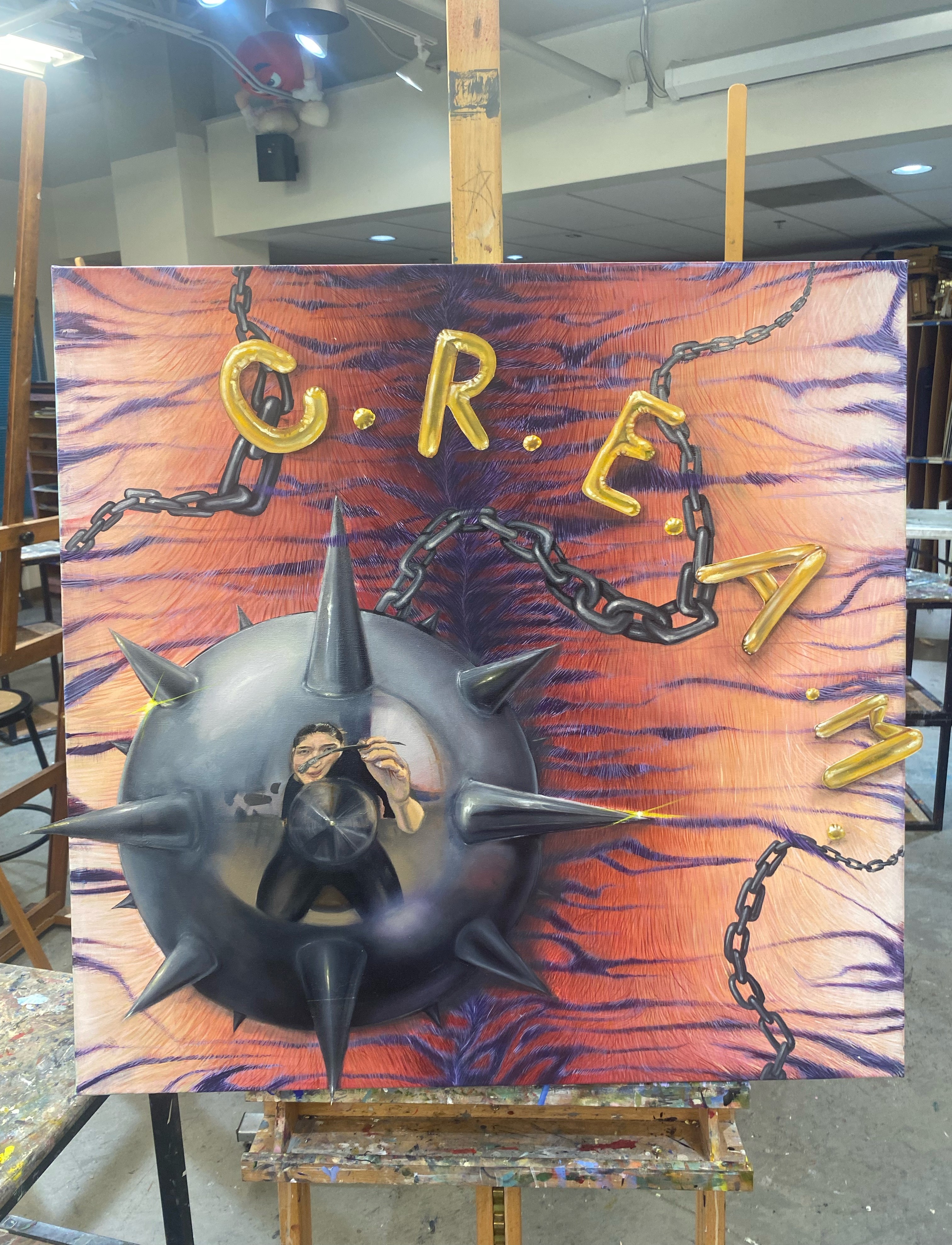 painting of a wrecking ball with face in it