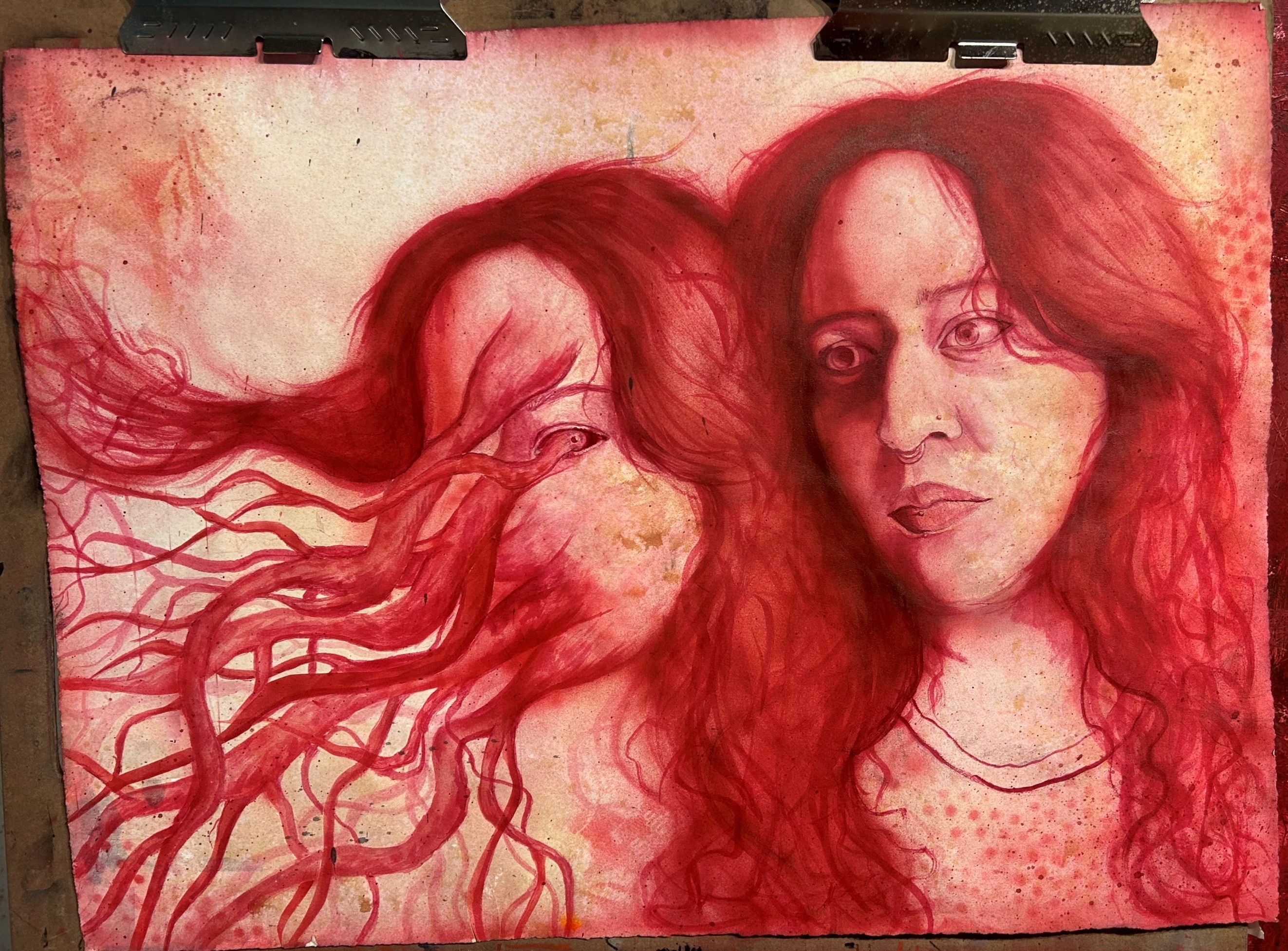 mixed media drawing of woman on dyed red paper