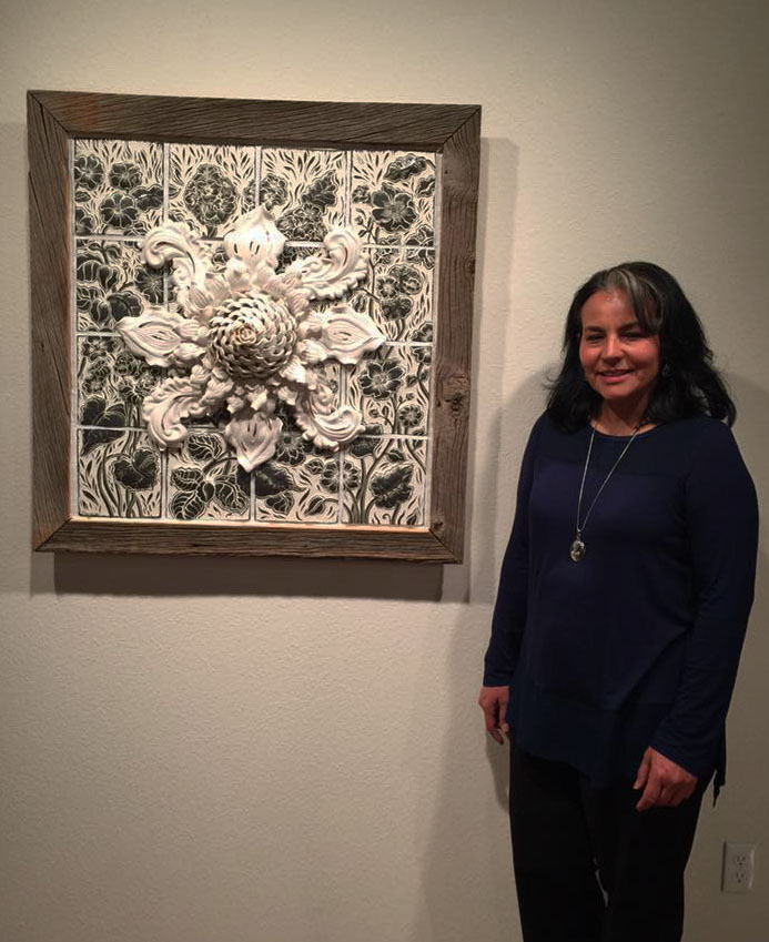 Elise Uribe at her senior exhibition 