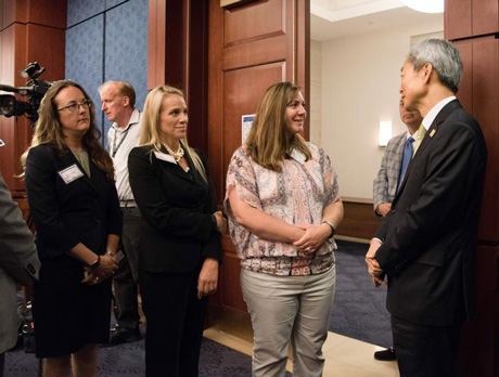 People conversing amonst each other