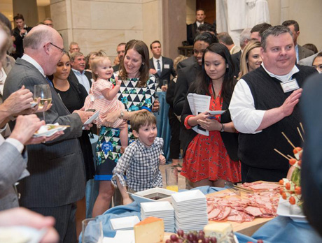People gathering around food