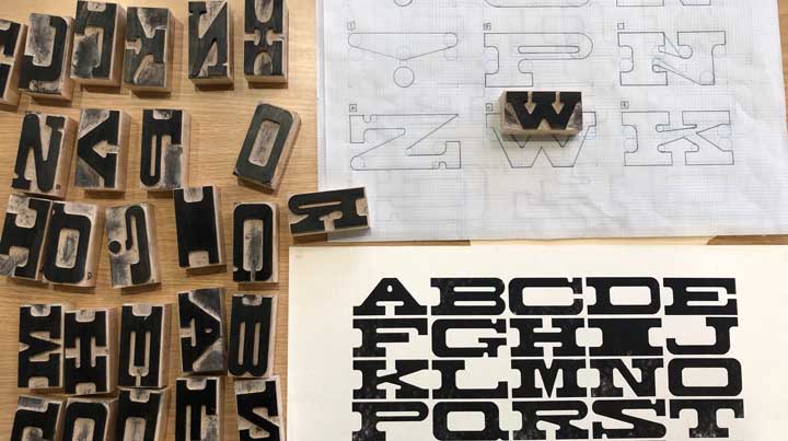Associate Professor of Art Eli Hall created handmade wooden typographical letters.