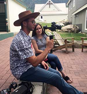 alumnus ethan ball and student amber whisman filming in Crested Butte