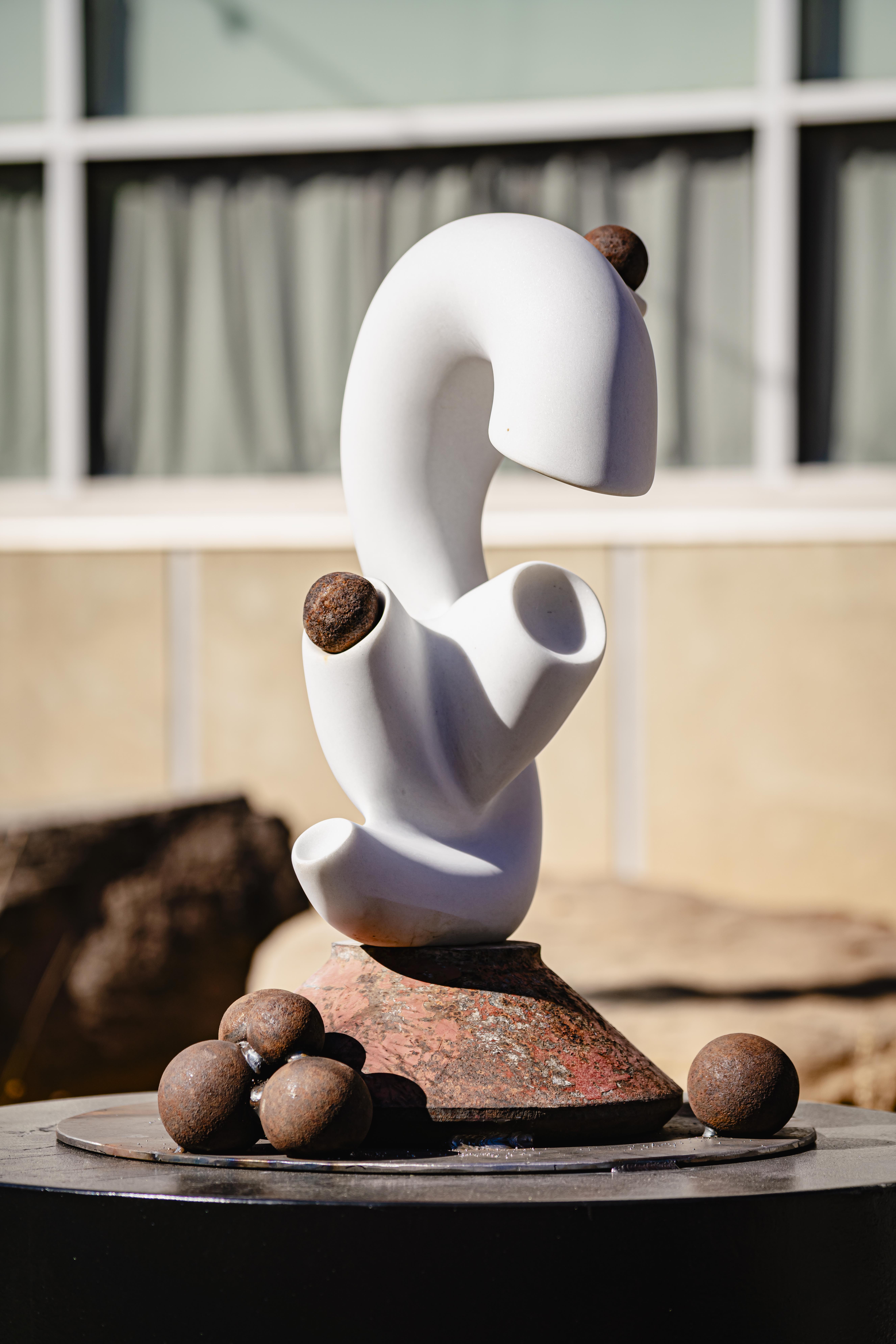 White statue that looks like a heart valve