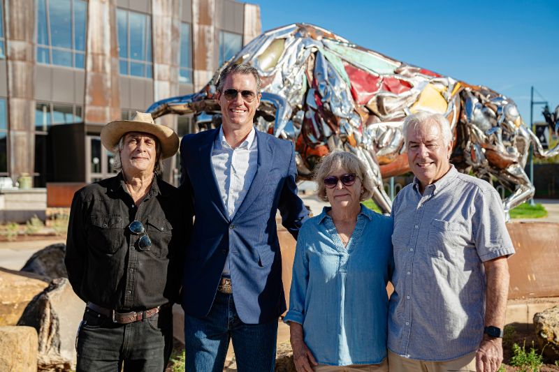 Artist and CMU supporters stand with President Marshall at statue unveiling event