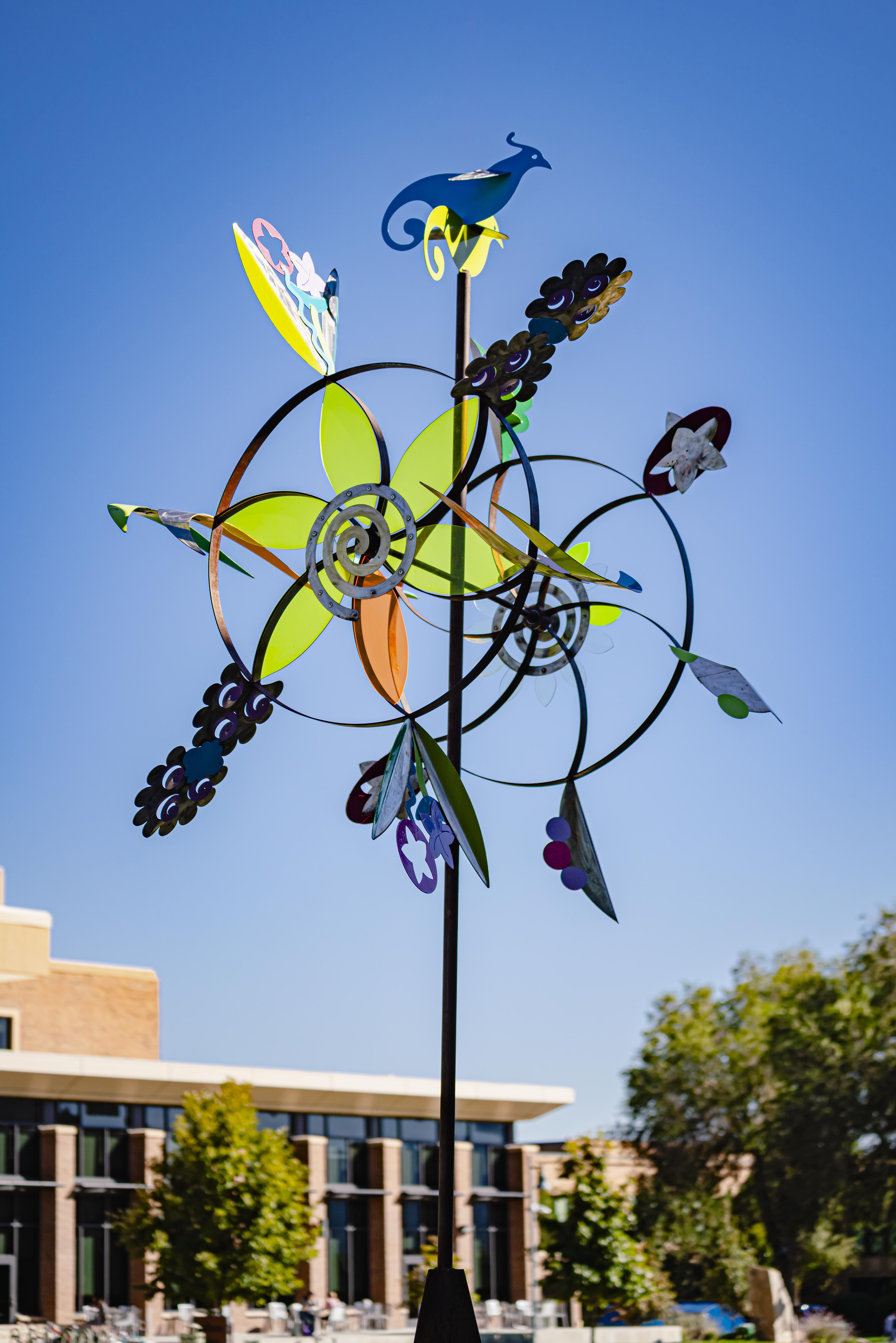 Multicolored statue in the same of a star flower