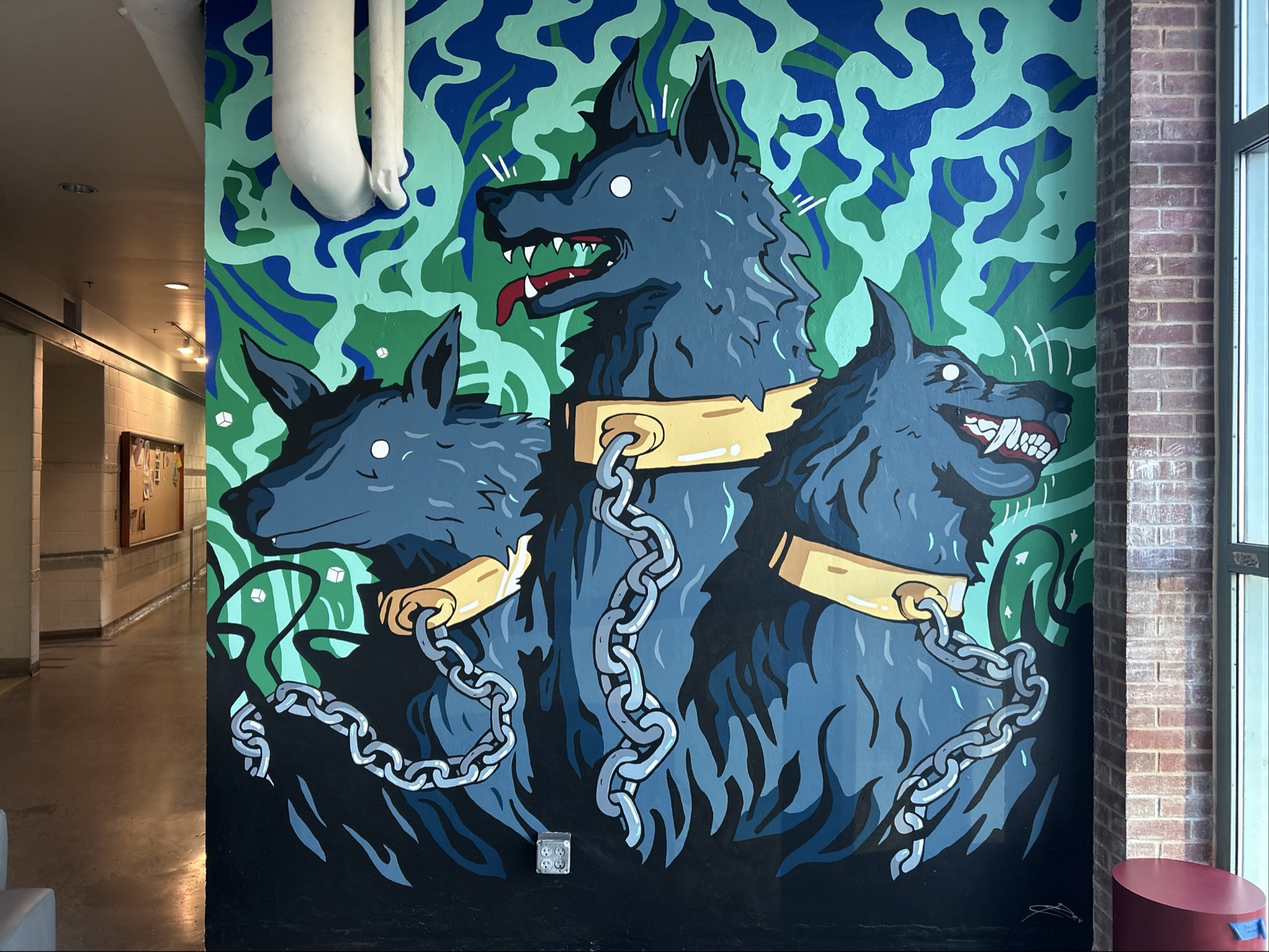 mural painting of three dogs 