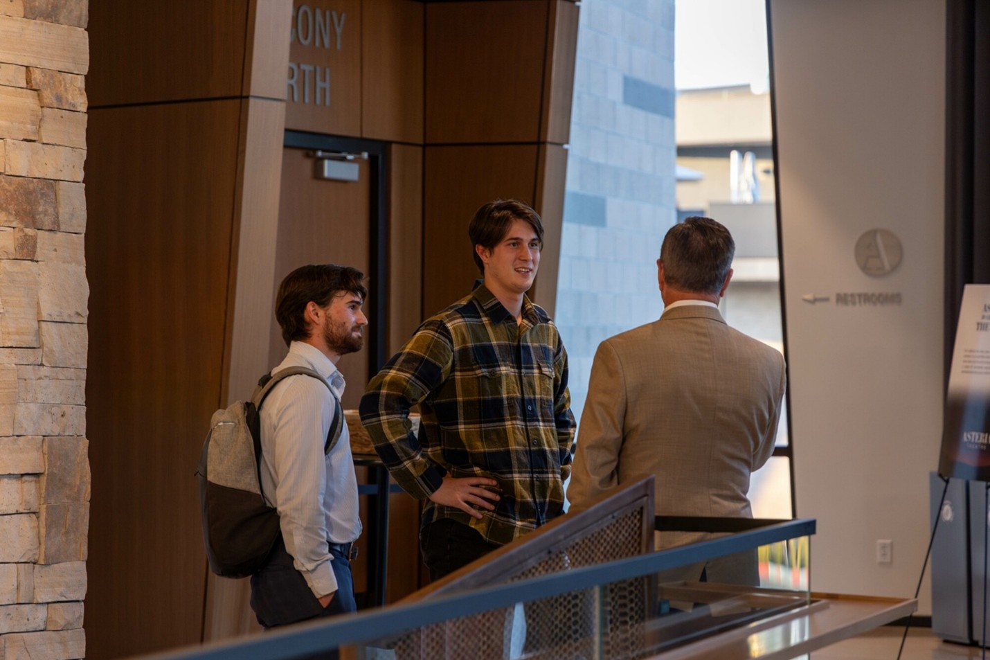 People standing inside Asteria