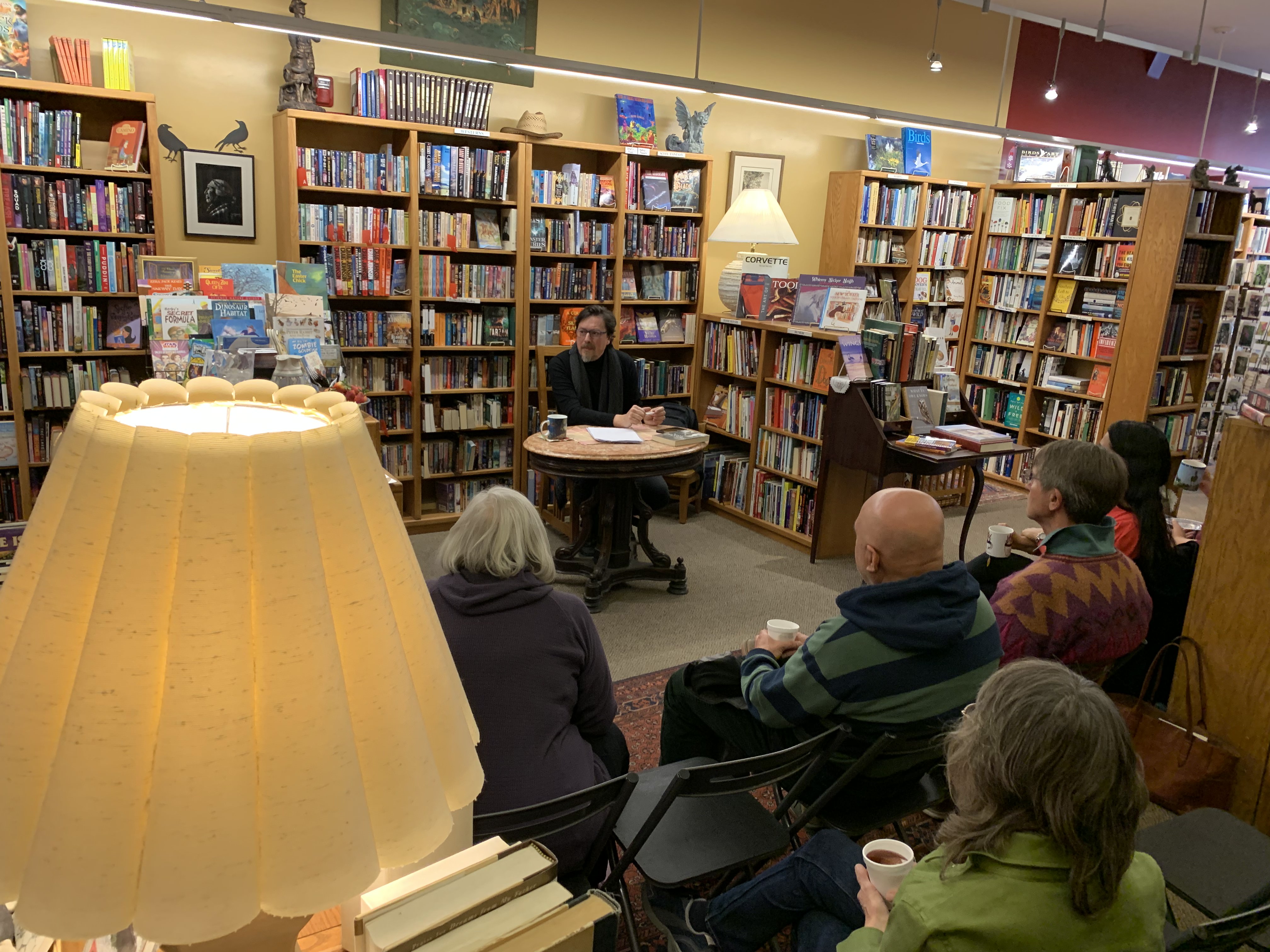Antonio Ceballos reading to community members